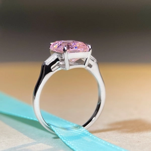 S925 sterling silver ring with 5ct radiant cut pink diamond on blue satin ribbon