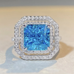 Bague luxueuse en argent S925 avec aigue-marine taille radiant et double halo de diamants
