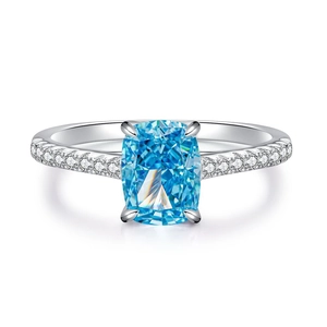 S925 silver ring featuring a radiant cut blue aquamarine stone and pave diamonds