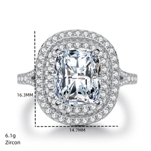 Macro view of S925 silver radiant cut zircon ring with double halo and side stone details
