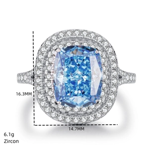 Macro view of cushion cut blue zircon ring with halo diamond setting and measurements