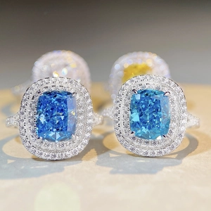 Elegant S925 silver cushion cut blue sapphire halo ring with sparkling zircon stones
