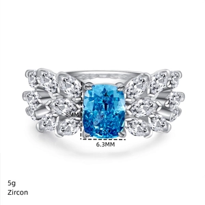 Detailed specs showing 5g weight and 8x6.3mm blue zircon stone on silver ring