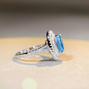 Princess cut aquamarine cubic zirconia ring in sterling silver with double halo setting