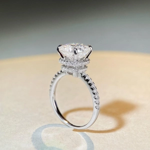 Classic S925 sterling silver ring with 45-degree view of round moissanite and hidden halo