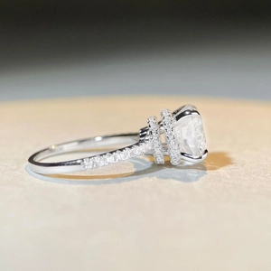 Sparkling S925 sterling silver ring with a large round moissanite in a 4-prong setting