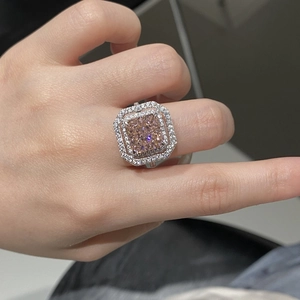Detailed view of luxury S925 silver ring featuring a large pink square-cut centerpiece stone