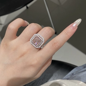Macro detail of S925 sterling silver ring featuring a pink square-cut zircon stone