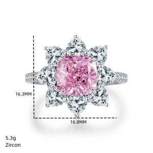 Macro detail of S925 silver pink cushion-cut zircon ring with heart-shaped halo