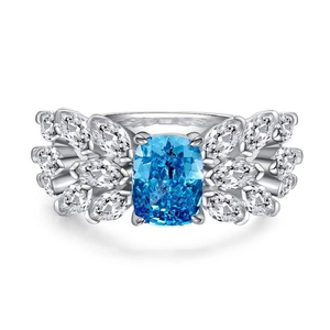 S925 silver ring featuring aquamarine center stone and white zircon butterfly wings