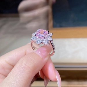 Macro shot of S925 silver ring featuring a pink sunflower cushion-cut gemstone detail