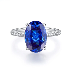 Luxurious S925 silver ring with 6-carat oval blue sapphire and pavé-set diamond accents