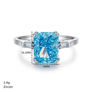 Detailed view of rectangle cut sea blue zircon ring with 10.5x9MM stone and silver band