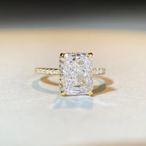 Luxurious 18K gold S925 silver ring featuring a large princess cut square center stone