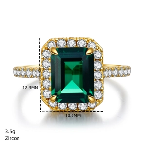 Macro view of emerald-cut green zircon ring with size and weight details on white background