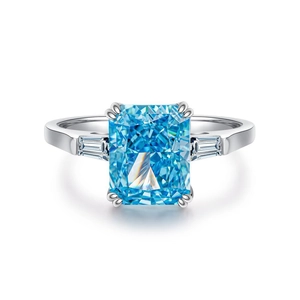 Luxurious S925 silver ring featuring a radiant cut blue zircon with side baguette diamonds