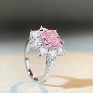 S925 sterling silver ring with cushion cut pink stone and teardrop flower halo design