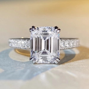 Classic S925 silver emerald cut ring with a pavé-set diamond band from a 45-degree angle