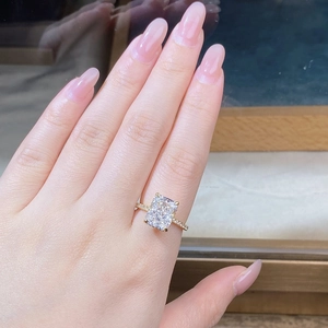 Detailed view of an 18K gold S925 silver ring featuring a radiant cut centerpiece stone