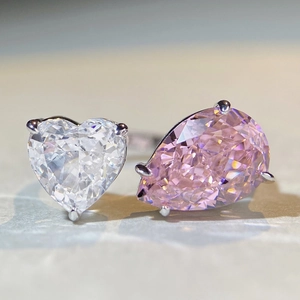 Elegant 925 sterling silver ring with heart and pear shaped pink crystal stones