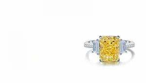 Detail showing 4ct yellow radiant cut diamond set in S925 sterling silver ring