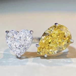 Toi et Moi S925 sterling silver ring with heart-cut clear and pear-cut yellow stones