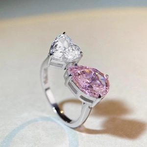 925 silver Toi et Moi ring featuring heart and pear cut stones in a classic prong setting
