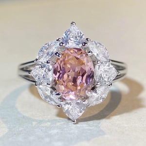 Elegant S925 silver halo ring with oval pink sapphire and floral petal diamonds