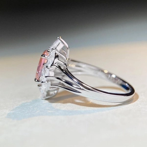 Elegant S925 silver ring featuring a large pink oval gemstone and marquise accents