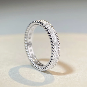 Elegant S925 sterling silver eternity ring with zircon stones and beaded edges