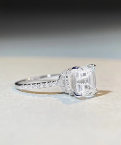Macro shot of Asscher cut moissanite ring with hidden halo in S925 sterling silver