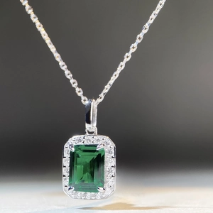 Elegant S925 sterling silver emerald cut green zircon necklace with halo diamond border