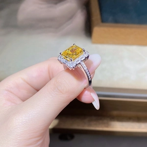 Detailed shot of S925 silver ring featuring a radiant cut yellow zircon in a prong setting
