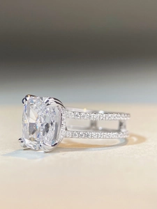 Macro side view of cushion-cut zircon ring with double-row micro-pave setting