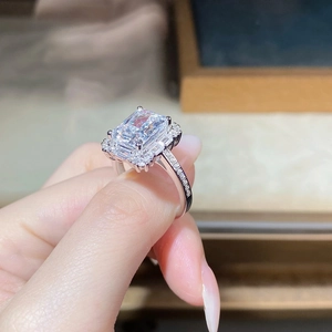 Macro detail of Radiant cut diamond silver ring showing exquisite side pave setting and sparkle