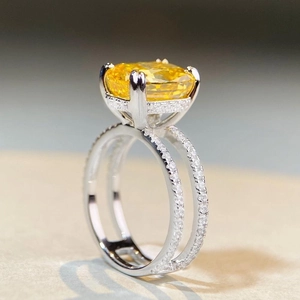 Luxurious S925 silver ring featuring a large cushion-cut yellow zircon and pave diamonds