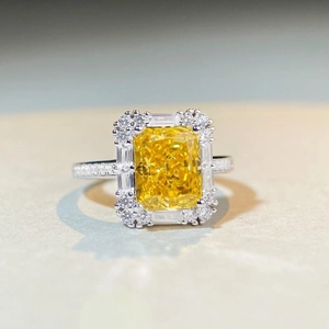 S925 sterling silver ring featuring radiant cut yellow gemstone with halo setting