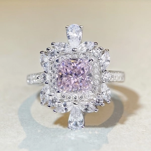 Luxurious S925 silver ring featuring a cushion-cut pink gemstone with sparkling floral halo
