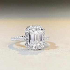 Elegant S925 sterling silver emerald cut moissanite ring with halo setting on slim band