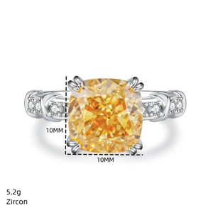 Macro dell'anello incrociato in argento S925 con zircone giallo 10mm e dettagli