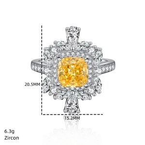 Detailed view of princess cut yellow zircon ring with halo crystals and measurements