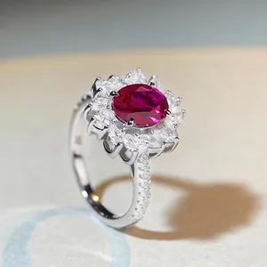 Luxurious S925 silver ring with oval pigeon blood red gemstone and floral zircon halo