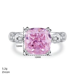 Macro view of 10mm pink cushion-cut zircon ring with silver band and side stones