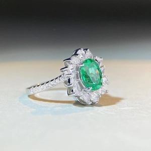 Luxurious S925 silver ring with oval green paraiba stone and sparkling zircon halo