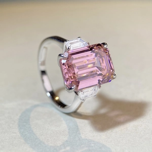 Emerald cut pink zircon 925 sterling silver ring with side stones in a 45-degree view