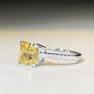 S925 sterling silver ring with radiant cut yellow zircon and pavé set side stones
