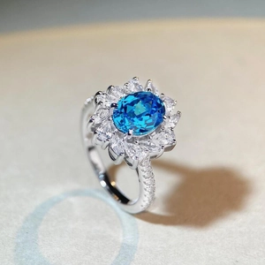 Luxurious S925 sterling silver ring with oval blue aquamarine and sparkling zircon halo