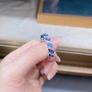 Close-up of S925 silver ring with blue rectangular stones and round zircons