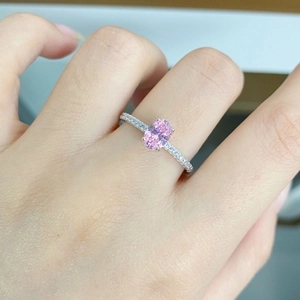 Elegant S925 silver ring featuring an oval pink gemstone with pavé setting craftsmanship
