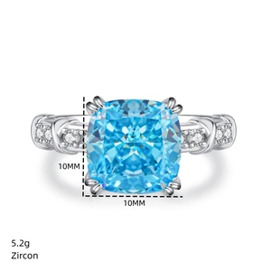 Detail view of square cut aquamarine zircon ring with 10mm stone and 5.2g silver band